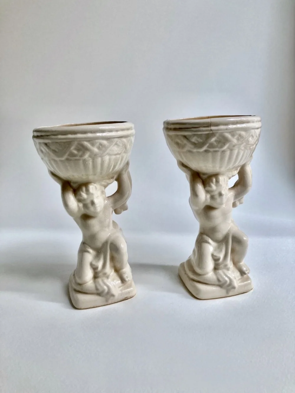 Vintage Rococo Pair of Cream Ceramic Cherub Urns